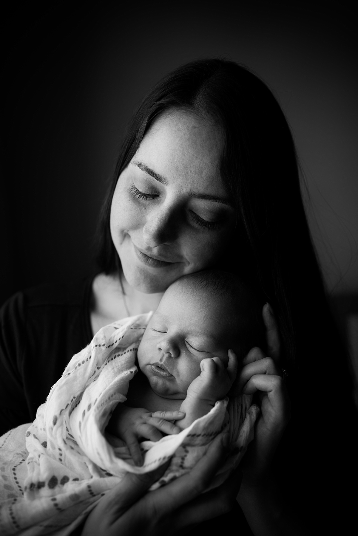 Black and white newborn photo of mom and baby boy in Cameron Station, Va