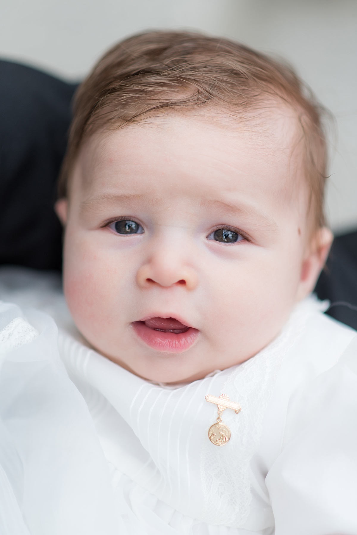 Baby being Baptized at St. Mary's Bascilica in Old Town Alexandria, VA by Erin Tetterton Photography