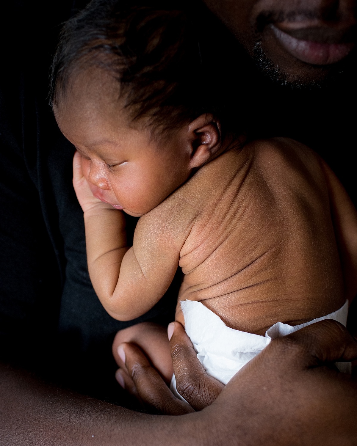DC Newborn Photographer captures newborn at home in lifestyle newborn session